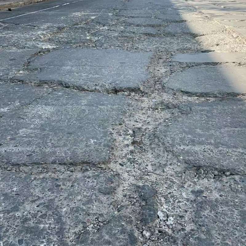 新芜路面起砂露石子修补料
